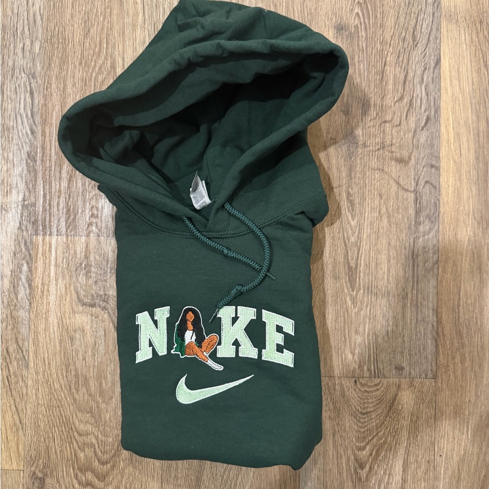 SZA Nike green hoodie